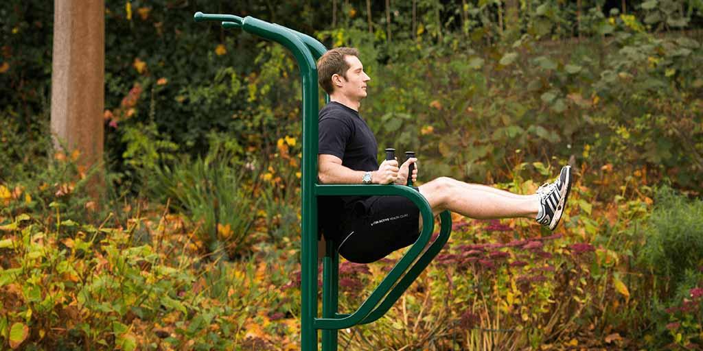 man using leg lift station 