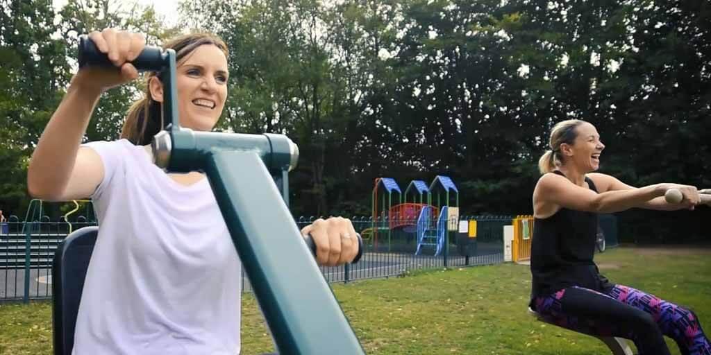 women working out on gym equipment