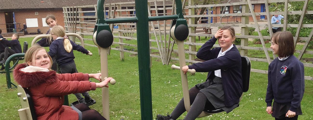 children using seated leg press