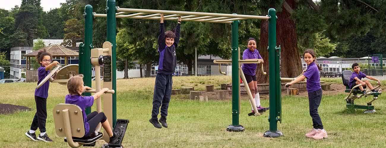 children using Fresh Air Fitness Children's Fitness Rig
