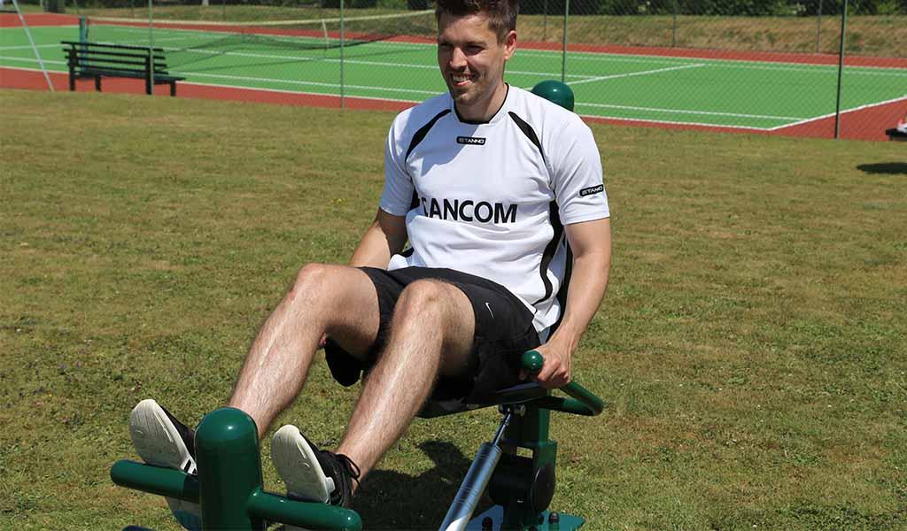 man using resistance leg press