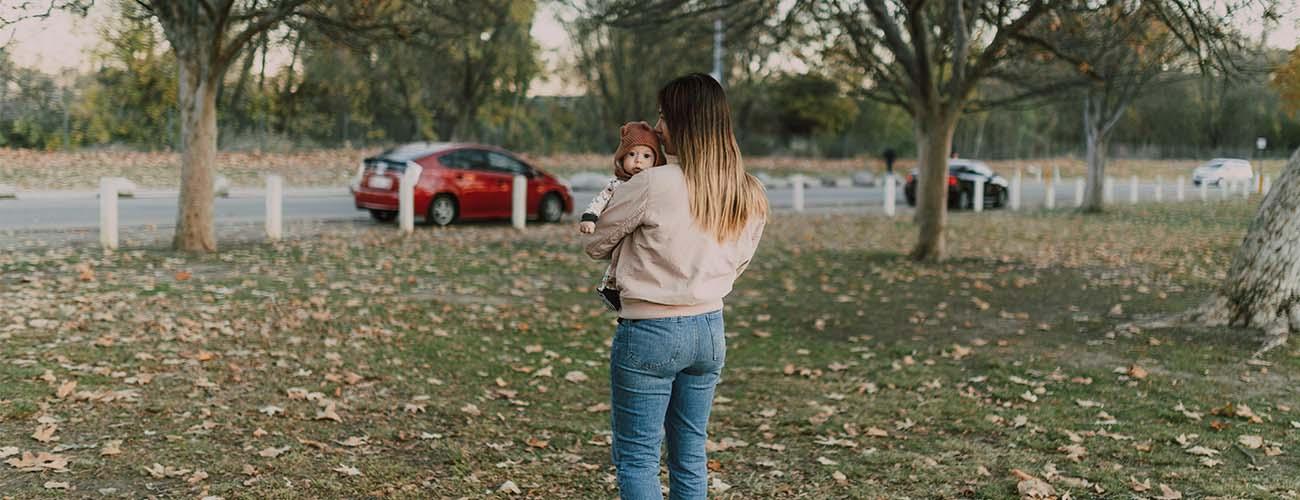 lady in park with baby