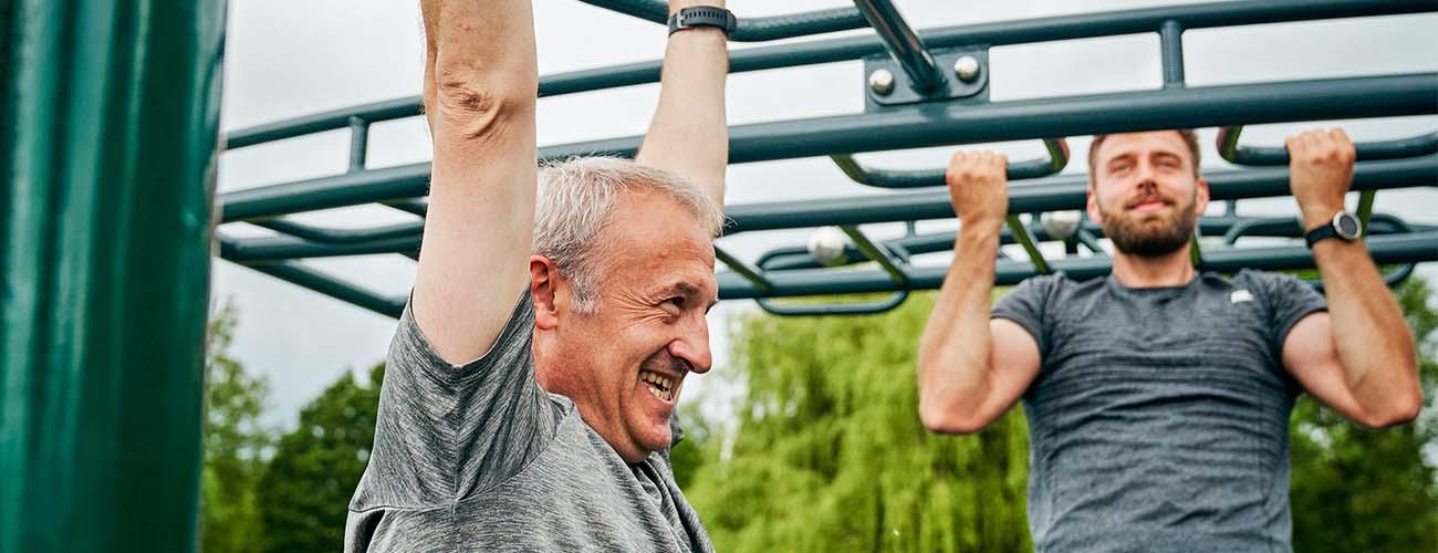 man working out with dad on Father’s Day