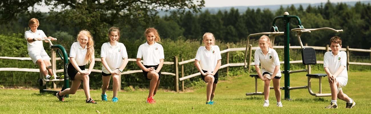 School children with outdoor gym specialists. Fresh Air Fitness
